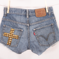 Levi's denim high waist shorts with bronze studded cross