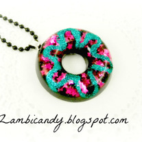 Black and pink sparkly resin donut necklace