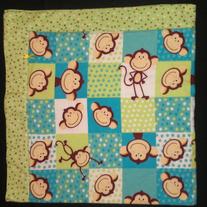 Monkey_squared_on_green_dot_medium