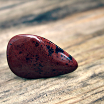 ruby. red speckled cab ring
