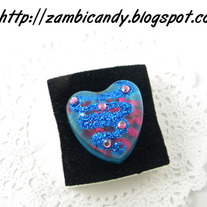 Adjustable sparkly resin blue heart ring