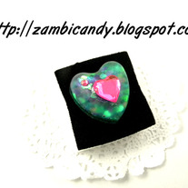 Adjustable sparkly blue heart resin ring
