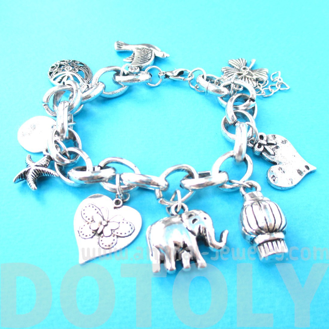 Elephant Starfish Doves Animal Shaped Charm Bracelet in Silver · DOTOLY Animal Jewelry · The