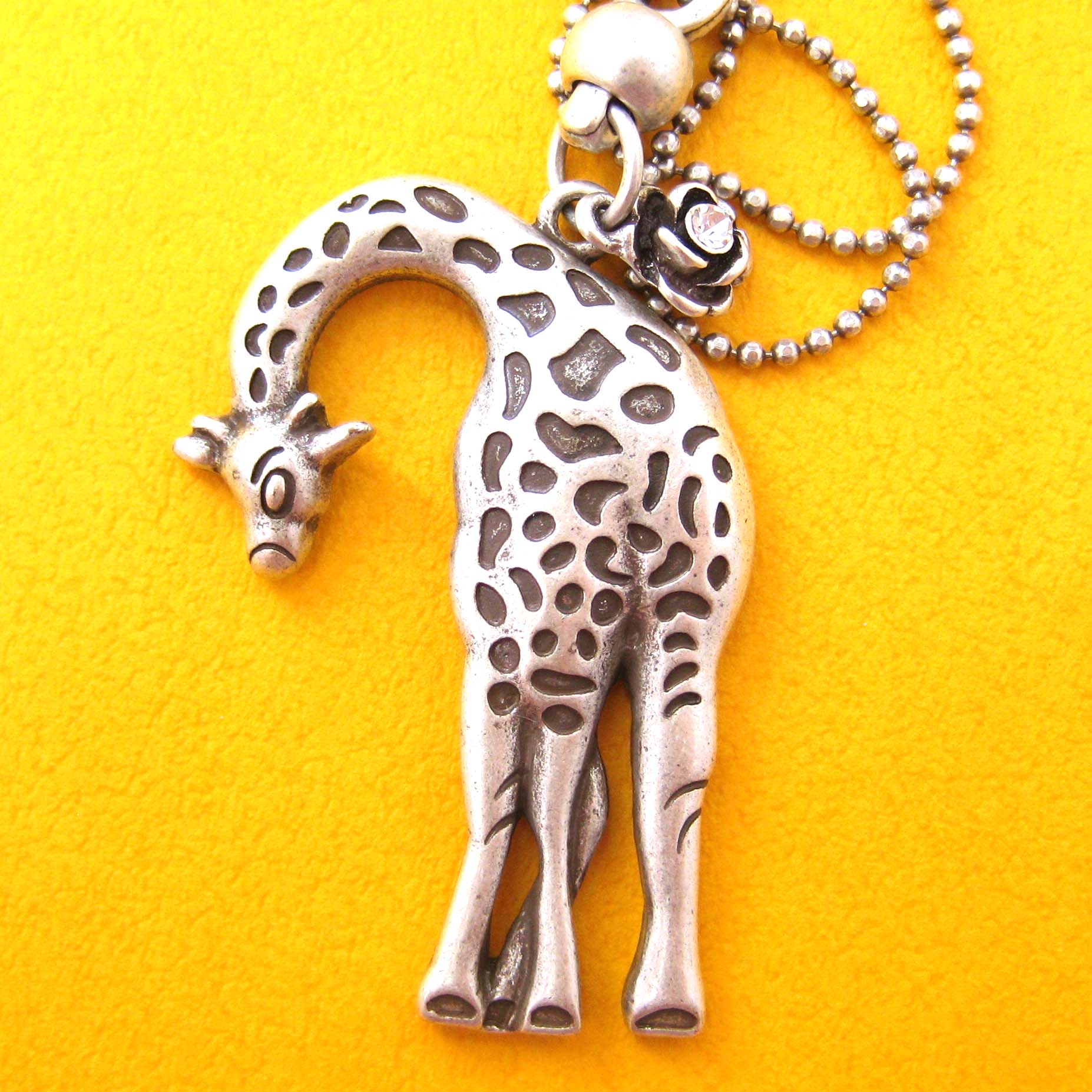 Simple Giraffe Animal Charm Necklace in Silver · DOTOLY Animal Jewelry