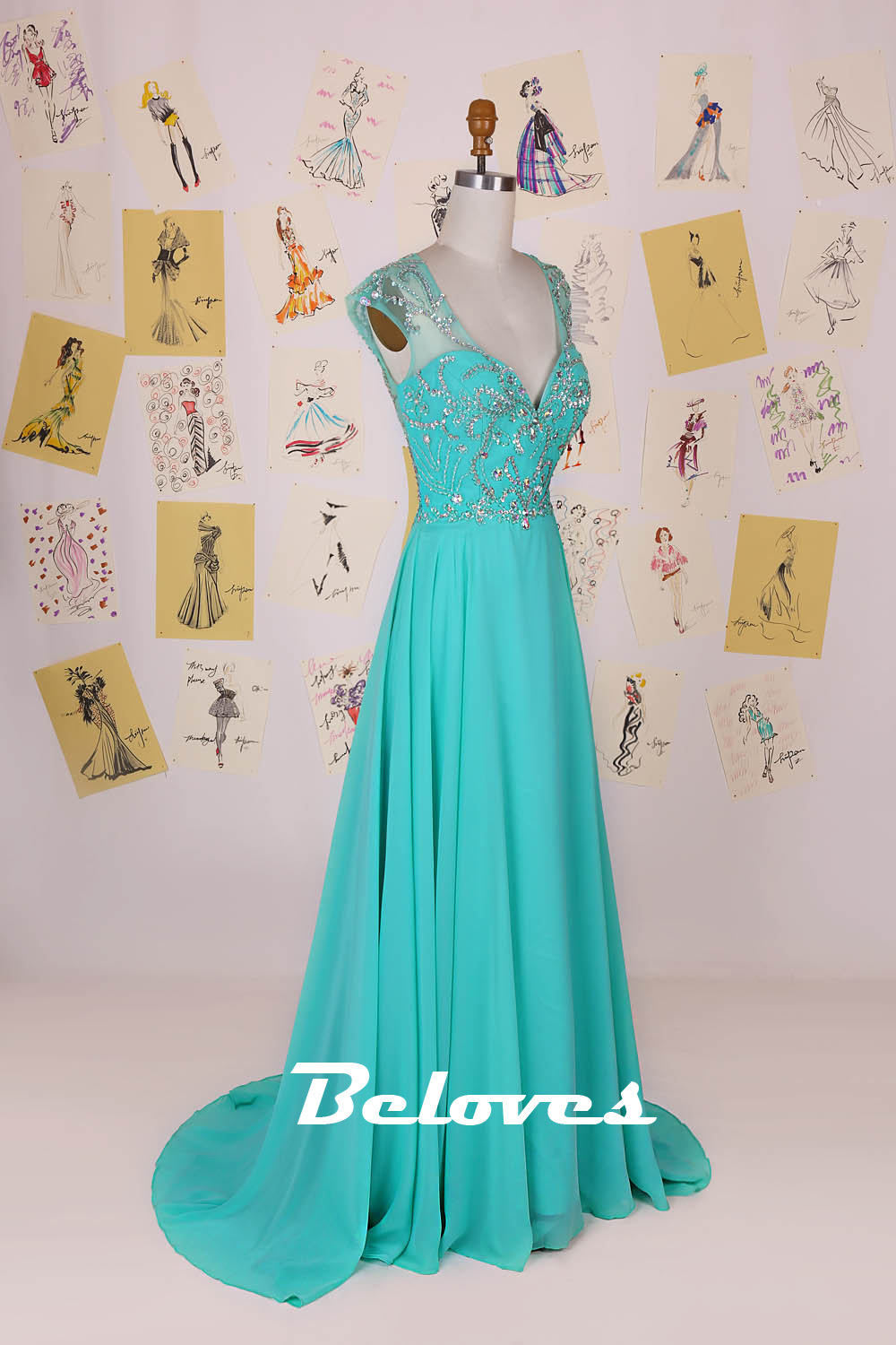 turquoise cap and gown