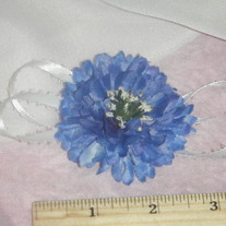 Blue flower witj white ribbon clip