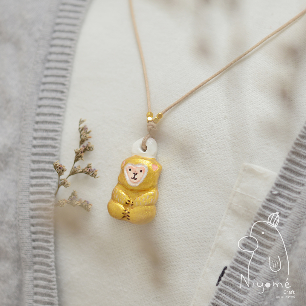golden lucky monkey handmade necklace by niyome craft on Storenvy