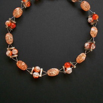 17" Orange beaded wire necklace