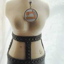 necklace. little sewing machine