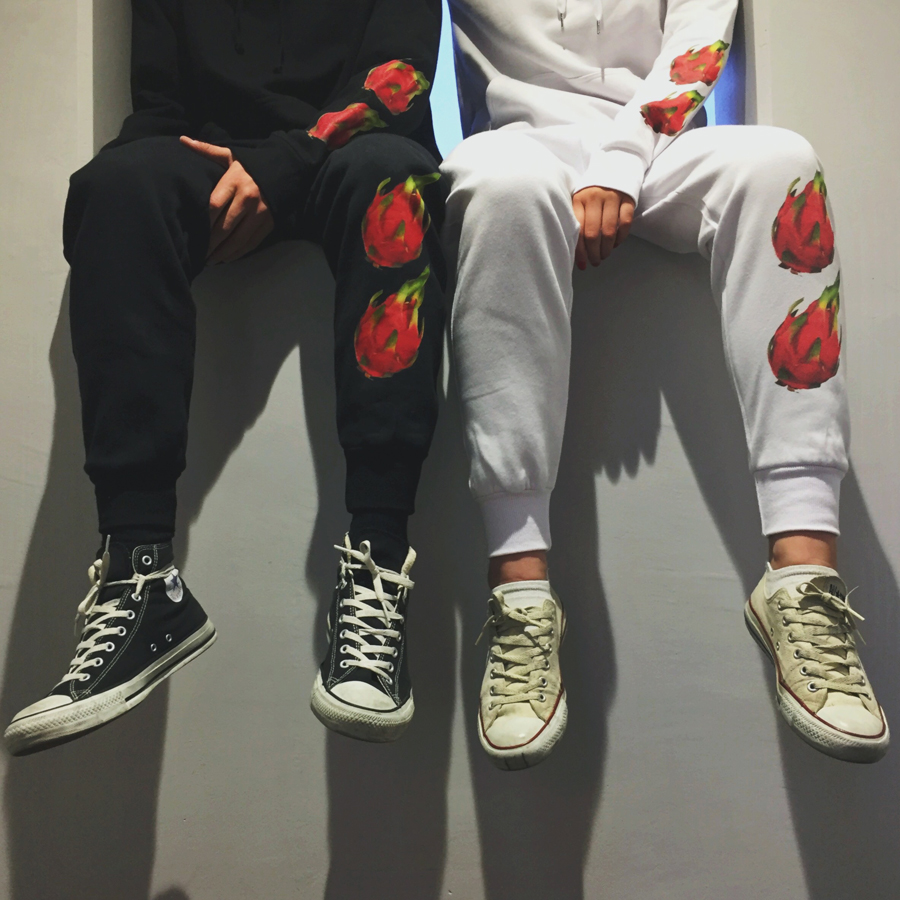 black sweatpants with red dragon