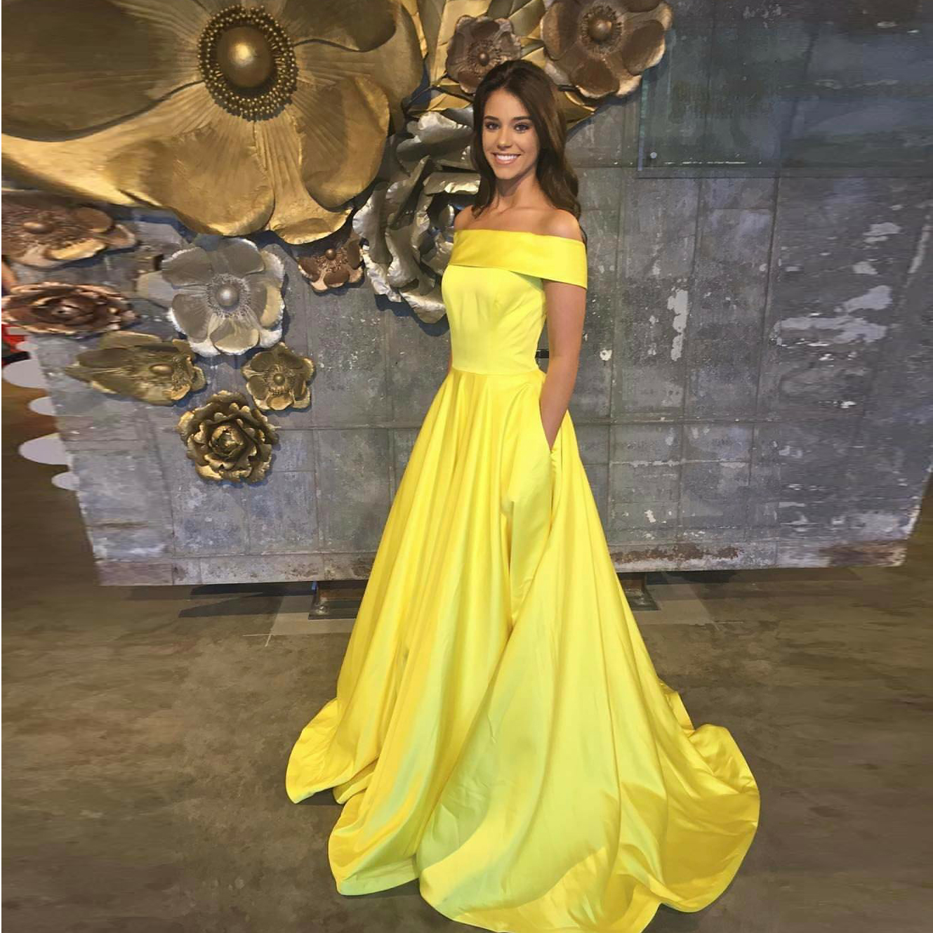 yellow off the shoulder ball gown