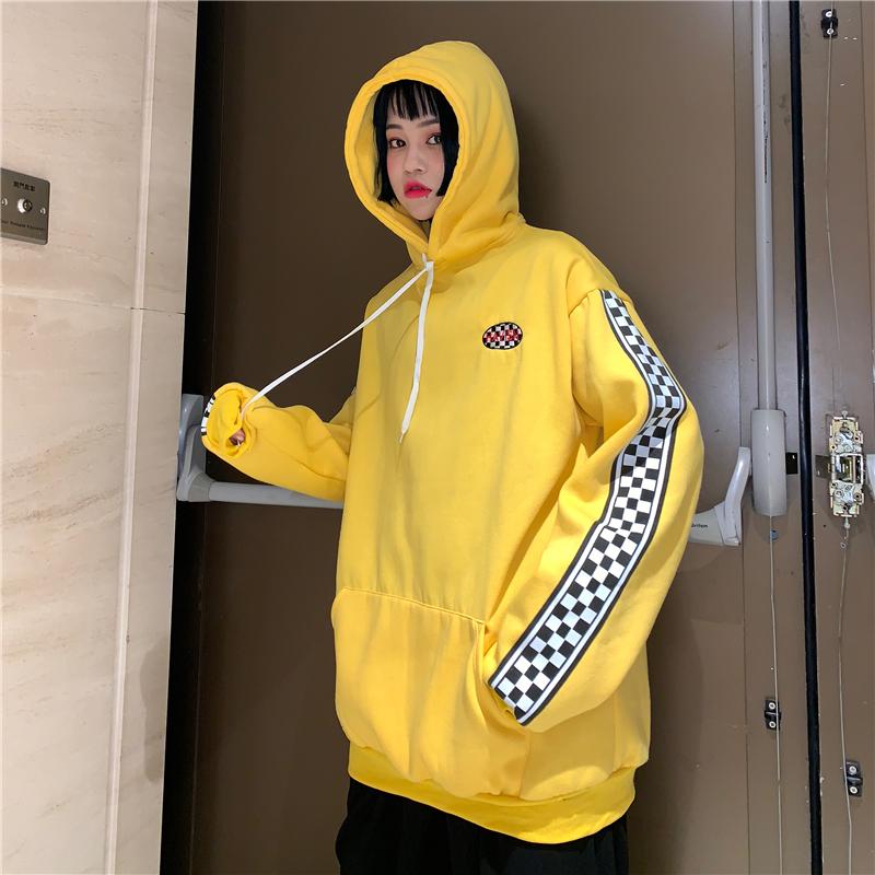 yellow hoodie with checkered sleeves