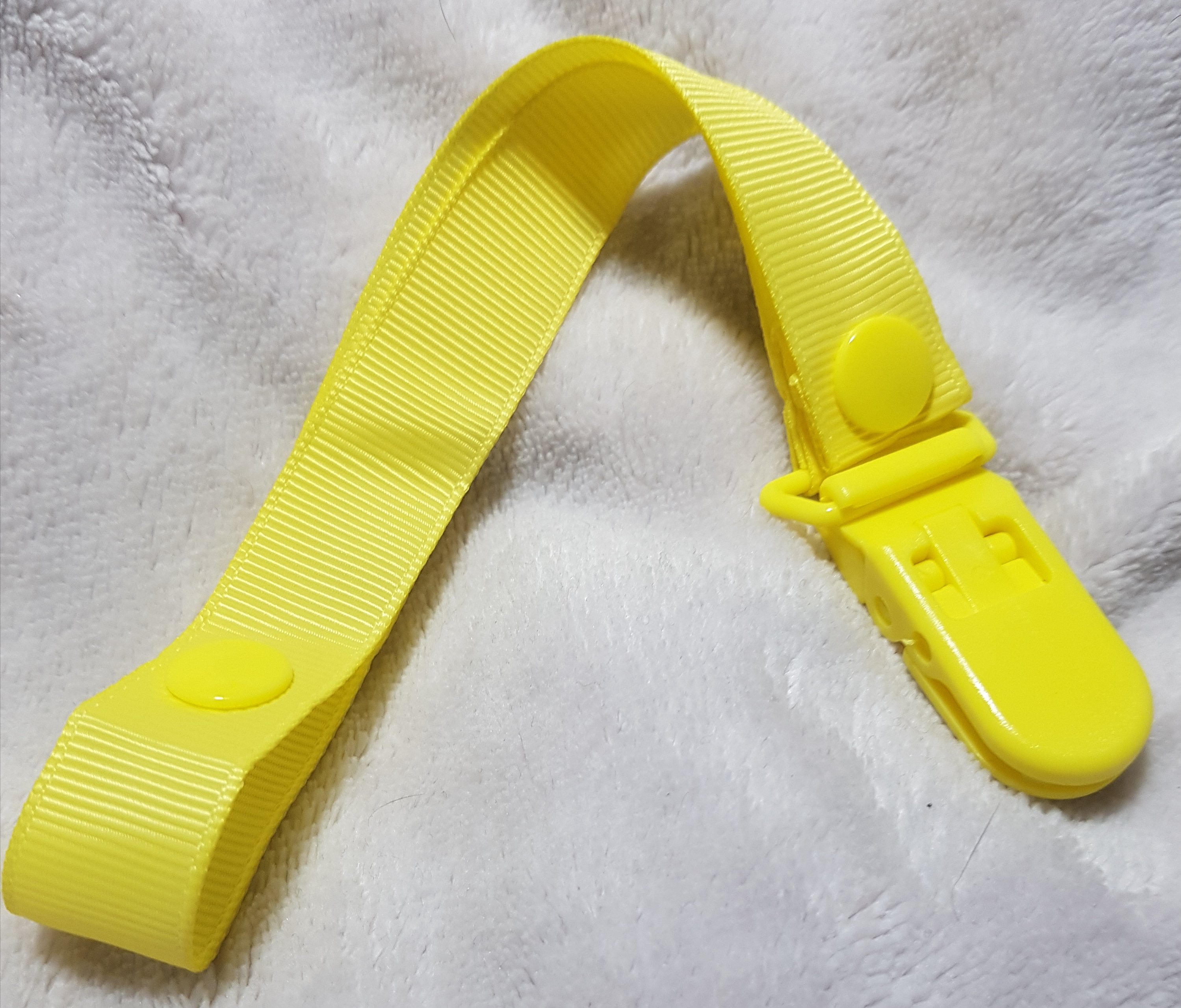 yellow pacifier